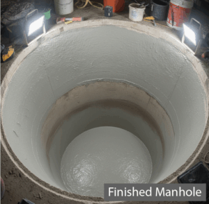Restored sewer manhole protected with corrosion-resistant SewperCoat lining